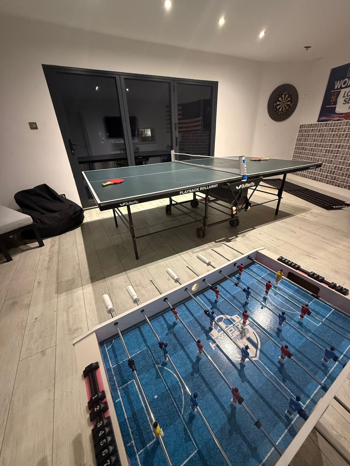 Games room with table tennis, table football and darts